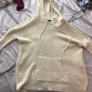 cream color sweater with hood